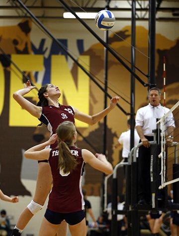 St. James sophomore Audriana Fitzmorris goes high for a spike in a substate playoff game at Turner High School on Oct. 26. St. James completed an undefeated season with a sixth straight state championship and a No. 1 ranking in the country.