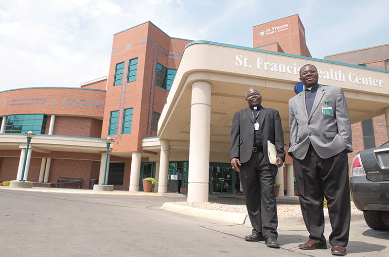 Father Diego Cadri, left, and Father Peter Nwanekezie serve as chaplains at St. Francis Health Center in Topeka, the only Catholic hospital in the archdiocese.  