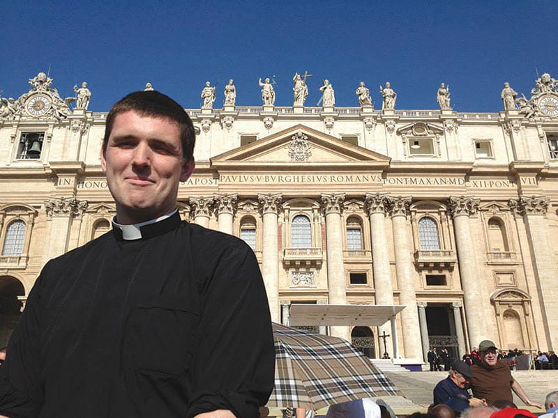 Deacon Matthew Nagle stands in front of St. Peter’s Basilica in Rome. Nagle and three others will be ordained to the priesthood on May 23 at St. Michael the Archangel Church in Leawood.