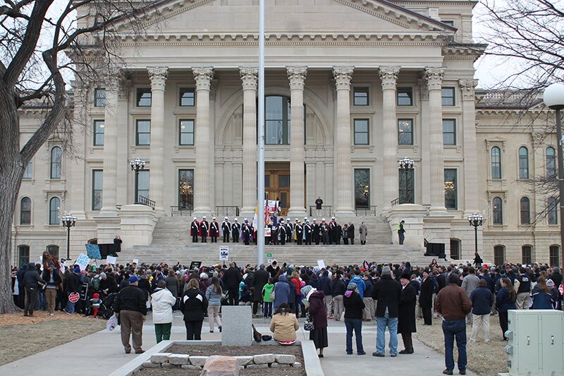 After Mass at the Topeka Performing Arts Center, the crowd marched to the state Capitol to hear remarks from Gov. Sam Brownback and other pro-life proponents.  