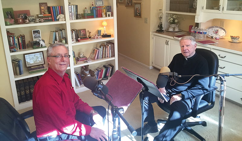 Chuck Jansen, a parishioner of Church of the Ascension in Overland Park records Msgr. Tom Tank’s faith story. Jansen produces faith stories on CDs and downloadable MP3s.   