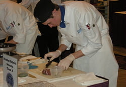 Kealan O’Boyle prepares a dish at the Kansas ProStart culinary competition. O’Boyle and his team from the Olathe school district won the Kansas competition and earned the opportunity to compete at the National ProStart Invitational, where they placed first out of 39 teams. Photo courtesy of Daniel O'Boyle.