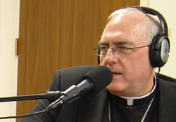 Leaven photo by Joe Bollig Archbishop Joseph F. Naumann hosts “The Shepherd’s Voice,” which can be heard at 10 a.m. on Sundays and 3:30 p.m. on Thursdays on KEXS. Archbishop Naumann and Archbishop Emeritus James P. Keleher also alternate hosting “The Catholic Way” program.