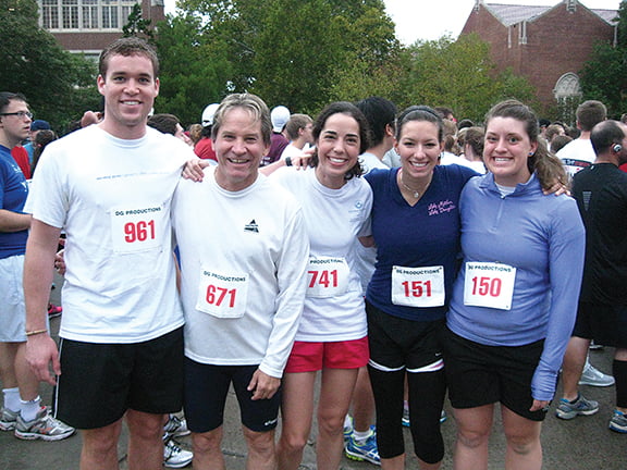 PHOTO COURTESY OF ANNA HALL Participating in a 5K run together are, from left: Father Jim Chamberlain; Hayley Ryckman, a student at the University of Oklahoma; Kelsey Bob, FOCUS missionary; and Anna Hall, FOCUS missionary. Hall has delayed her entry into the work force to become a missionary for FOCUS for two years.