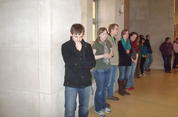 The lines of Benedictine College students waiting to receive the sacrament of reconciliation at St. Benedict’s Abbey church in Atchison have grown longer during the Lenten season.