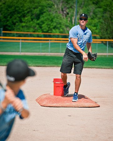 Former Kansas City Royals All-Star Mike Sweeney pitches and offers instruction at the Catholic baseball camp that bears his name. Photo by Lori Wood Habiger. 
