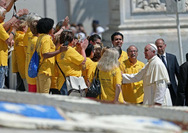 Pope Francis greets people during his weekly audience in St. Peter's Square at the Vatican June 3. (CNS photo/Alessandro Di Meo, EPA) See POPE-AUDIENCE June 3, 2015.