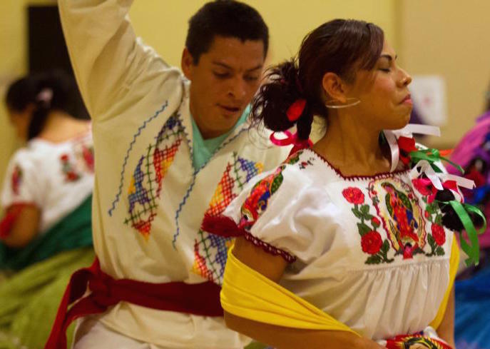 The image of Our Lady of Guadalupe is featured on the clothing of many of many of the dancers participating in an Oct. 30 event at Our Lady of the Valley Catholic Church in Caldwell, Idaho. (CNS photo/Chaz Muth)