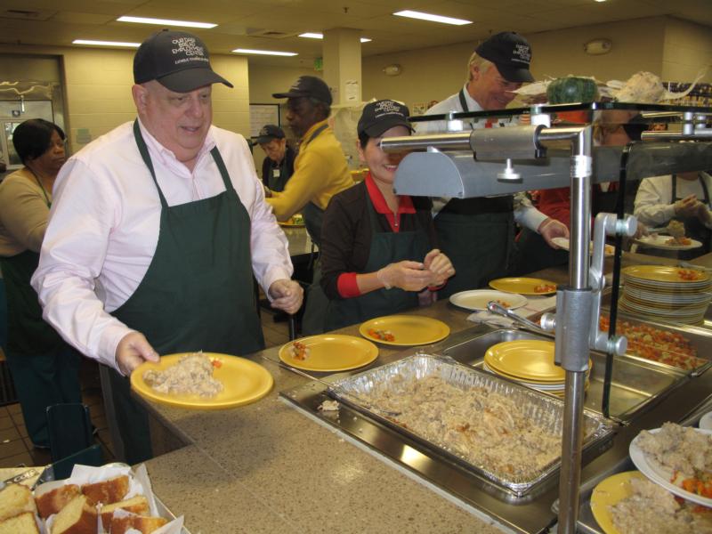 Maryland Gov. Lawrence Hogan Jr. volunteers at Our Daily Bread in Baltimore Nov. 24. The governor spent part of the morning volunteering at the Catholic Charities-run facility just two days before Thanksgiving. (CNS photo/George P. Matysek Jr., Catholic Review)