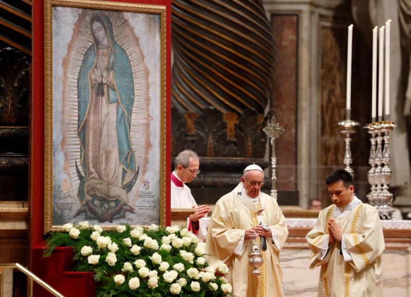Pope Francis uses incense to venerate an image of Our Lady of Guadalupe during Mass marking the feast of Our Lady of Guadalupe in St. Peter's Basilica at the Vatican Dec. 12. (CNS photo/Paul Haring)
