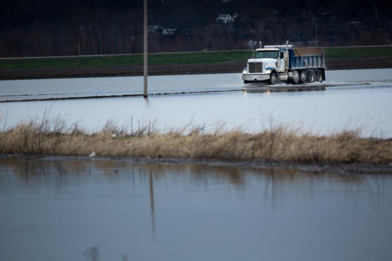 The Missouri Department of Transportation works to secure the Perryville, Mo., flood levee at the Horse Island Chute crossing Dec. 29, 2015. (CNS photo/Lisa Johnston, St. Louis Review)