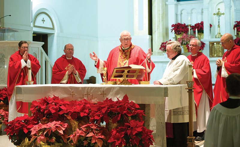 Archbishop Joseph F. Naumann of the Archdiocese of Kansas City in Kansas was the main celebrant of the Red Mass at Church of the Assumption in Topeka. Concelebrating with the archbishop are, from left: Father Christophe, a member of the Community of the Lamb in Kansas City, Kansas, Bishop Carl A. Kemme of the Diocese of Wichita, Bishop John B. Brungardt of the Diocese of Dodge City and Bishop Edward J. Weisenburger of the Diocese of Salina. Msgr. Gary Applegate was the master of ceremonies. Photo by Joe McSorley.