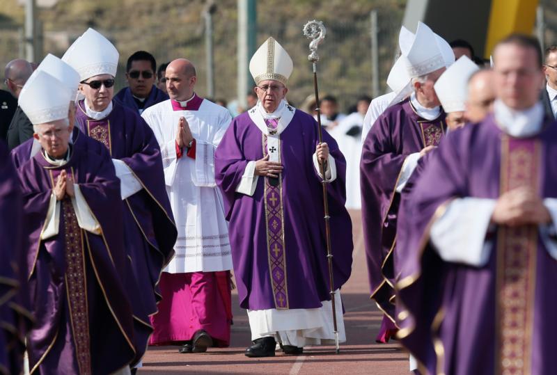 Pope Francis arrives in procession to celebrate Mass with priests and religious at a stadium in Morelia, Mexico, Feb. 16. (CNS photo/Paul Haring)