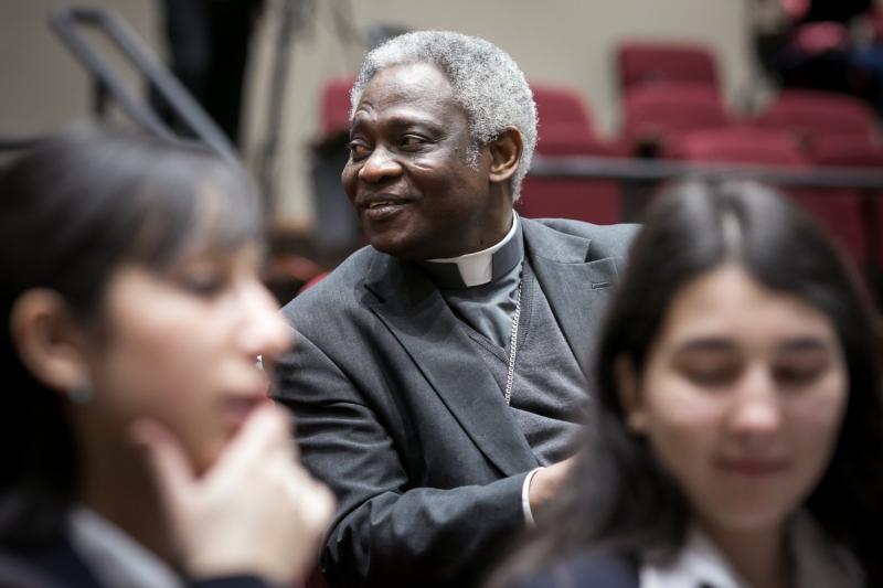 Ghanaian Cardinal Peter Turkson, president of the Pontifical Council for Justice and Peace, is seen on the campus of St. Thomas University in Miami Feb. 19 during a two-day international conference on climate change, nature and society. Cardinal Turkson delivered a keynote in which he discussed U.S. government policy on climate change and the position of the U.S. bishops on the issue. (CNS photo/Tom Tracy)