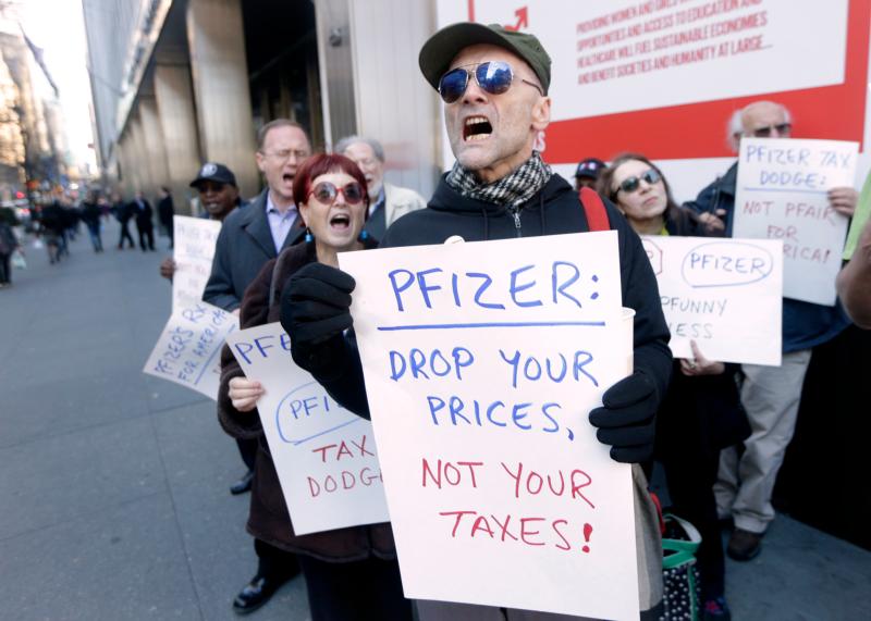 Demonstrators protest medicine prices outside Pfizer headquarters in New York City in this Dec. 4, 2015, file photo. (CNS photo/Andrew Gombert, EPA)