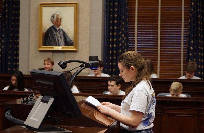 Anna Federico, an eighth-grader St. Aloysius School in Pewee Valley, Ky., plays the role of Atticus Finch in a re-enactment of Harper Lee's “To Kill a Mockingbird” at the Gene Snyder Courthouse in Louisville, Ky., Feb. 19. (CNS photo/Simon Caldwell, The Record)