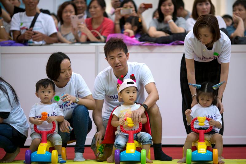 Parents in Hong Kong watch their babies during a crawling contest in this Aug. 2, 2014, file photo. (CNS photo/Jerome Favre, EPA)
