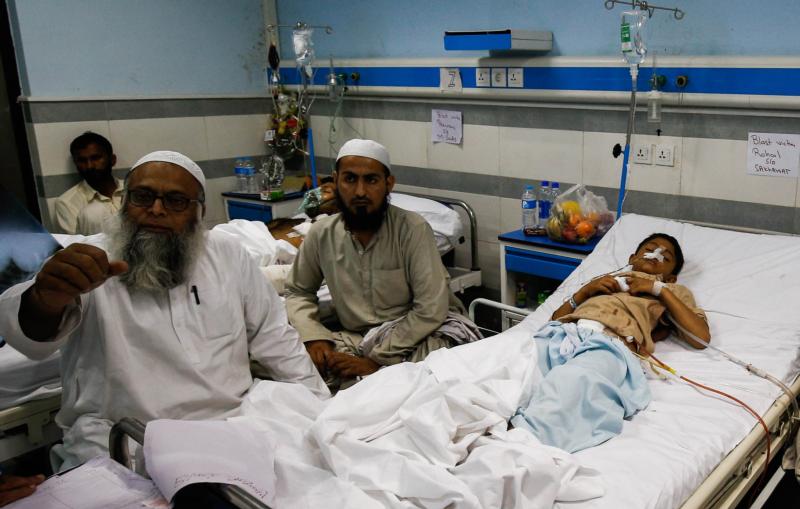 A boy who was injured in a suicide bomb attack at a public park in Lahore, Pakistan, on Easter, rests in his bed March 28 at a hospital in the city. Archbishop Sebastian Shaw of Lahore visited young victims at a hospital and described his experience as "truly difficult." (CNS photo/Omer Saleem, EPA)