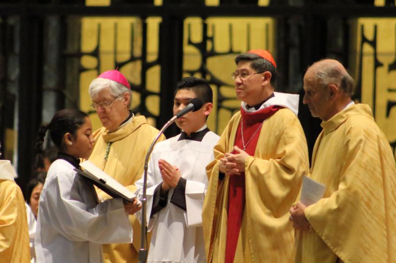 Cardinal Luis Antonio Tagle of Manila, second from right, celebrates Mass April 6 at St. Joseph's Oratory of Mount Royal in Montreal. An estimated 2,000 people attended the Mass. (CNS photo/Francois Gloutnay, Presence)