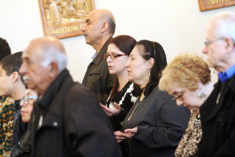 People pray during Mass April 3 at St. Maron Maronite Church in Philadelphia. The church is a place of worship for many Christians who come from various countries in the Middle East. (CNS photo/Sarah Webb, CatholicPhilly.com)