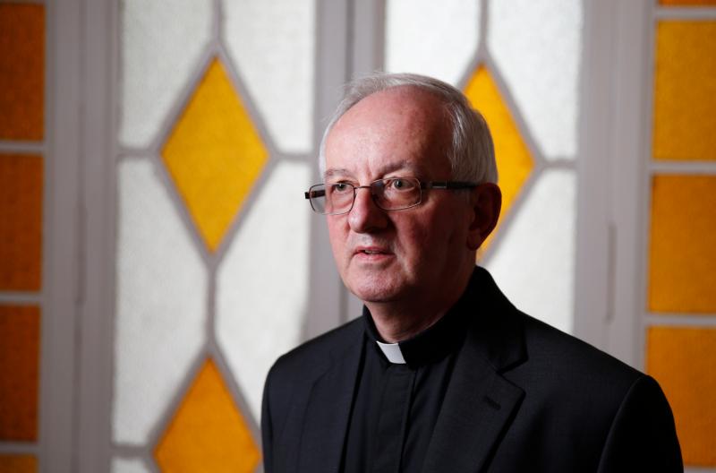 Father John Fogarty, superior general of the Congregation of the Holy Spirit, is pictured at the order's headquarters in Rome April 20. Father Fogarty said drawing up guidelines for the congregation to prevent sexual abuse "was the first priority" after he became superior in 2012. (CNS photo/Paul Haring)