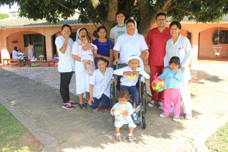 Lay Catholic missionary Connor Bergeron of Reston, Va., center back row, poses in this 2015 photo with people he served during his 16 months of working with the Salesian Lay Missioners in Yapacani, Bolivia. (CNS photo/courtesy of Connor Bergeron)