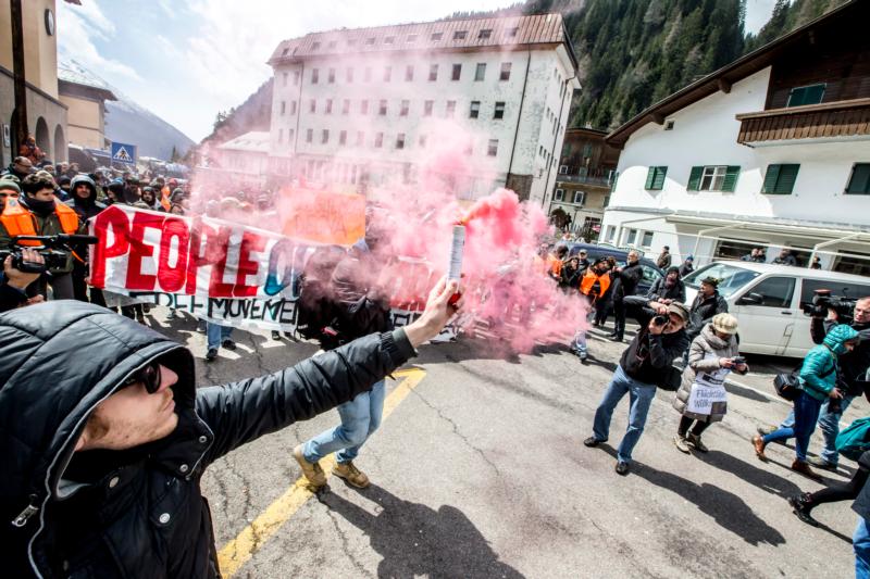 People demonstrate against the Austrian government's planned re-introduction of border controls at the Brenner Pass April 24. Bishop Agidius Zsfikovics of Eisenstadt has refused to allow an anti-refugee border fence across land belonging to his diocese, saying the government-backed move violates Christian values. (CNS photo/Jan Hetfleisch, EPA)