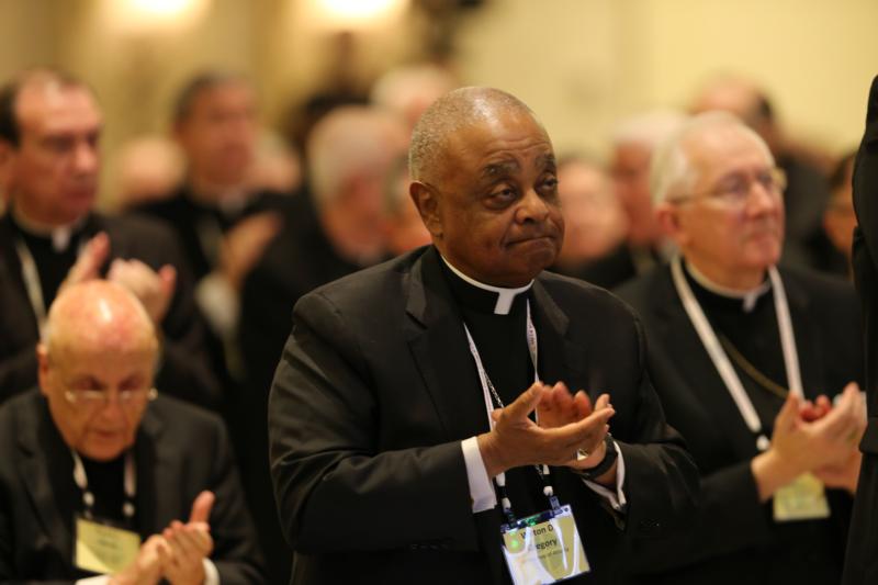 Atlanta Archbishop Wilton D. Gregory, center, and other prelates applaud Nov. 14 after an address by Archbishop Christophe Pierre, apostolic nuncio to the United States, during the annual fall general assembly of the U.S. Conference of Catholic Bishops in Baltimore. (CNS photo/Bob Roller) See BISHOPS- Nov. 14, 2016.