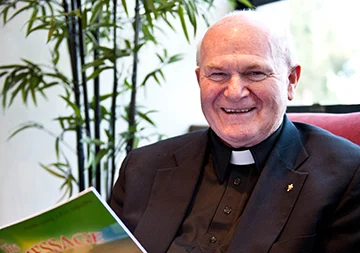 Father Mike Scully, OFM Cap., has a history of reaching young people by making connections between the Gospel and popular entertainment, particularly movies and rock music. Leaven photo by Joe Bollig
