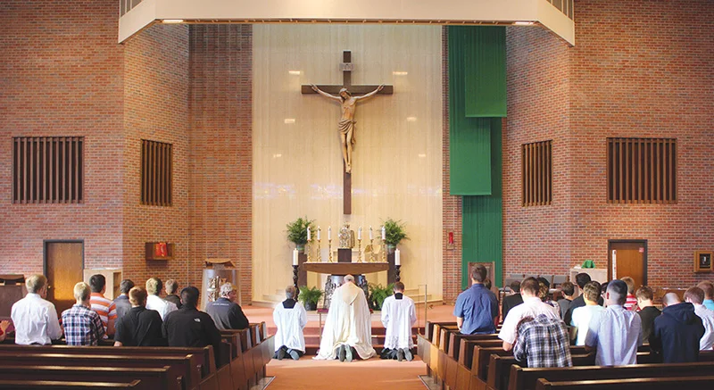 Leaven photo by Marc Anderson Archbishop Joseph F. Naumann leads eucharistic adoration at the Project Andrew event Oct. 25 at Christ the King Church in Topeka. Project Andrew is an evening designed for men at least 16 years old to help them learn how to discern God’s vocation for their lives.