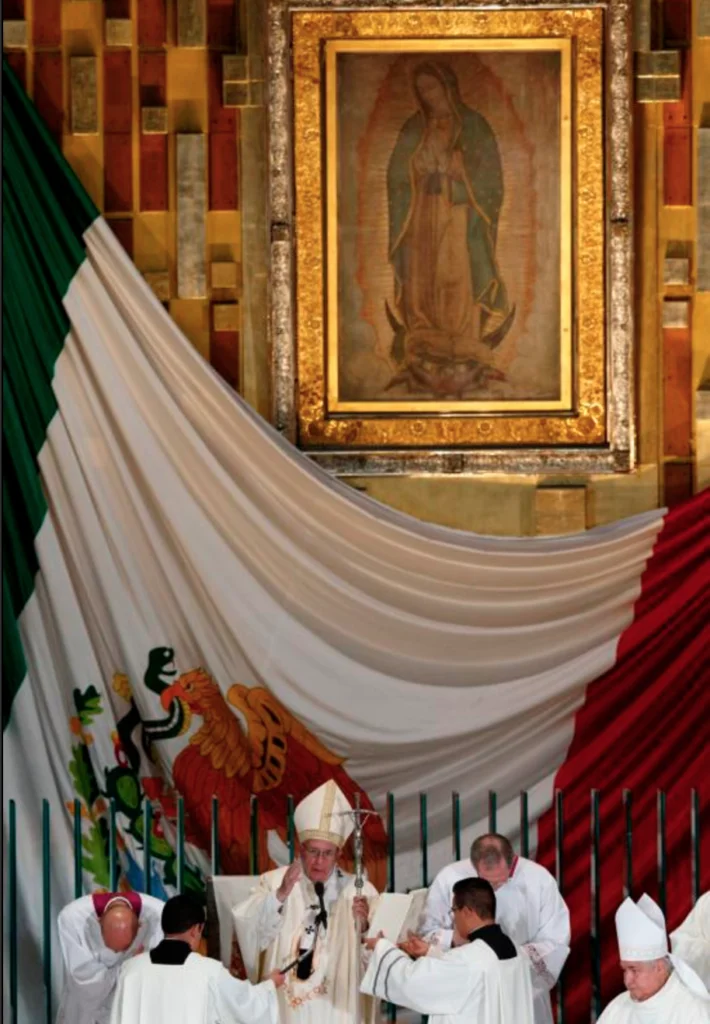 The original image of Our Lady of Guadalupe is seen as Pope Francis delivers his blessing Feb. 13 at the conclusion of Mass in the Basilica of Our Lady of Guadalupe in Mexico City. The message of Our Lady of Guadalupe is as relevant today as it was nearly 500 years ago, say scholars. (CNS photo/Paul Haring)