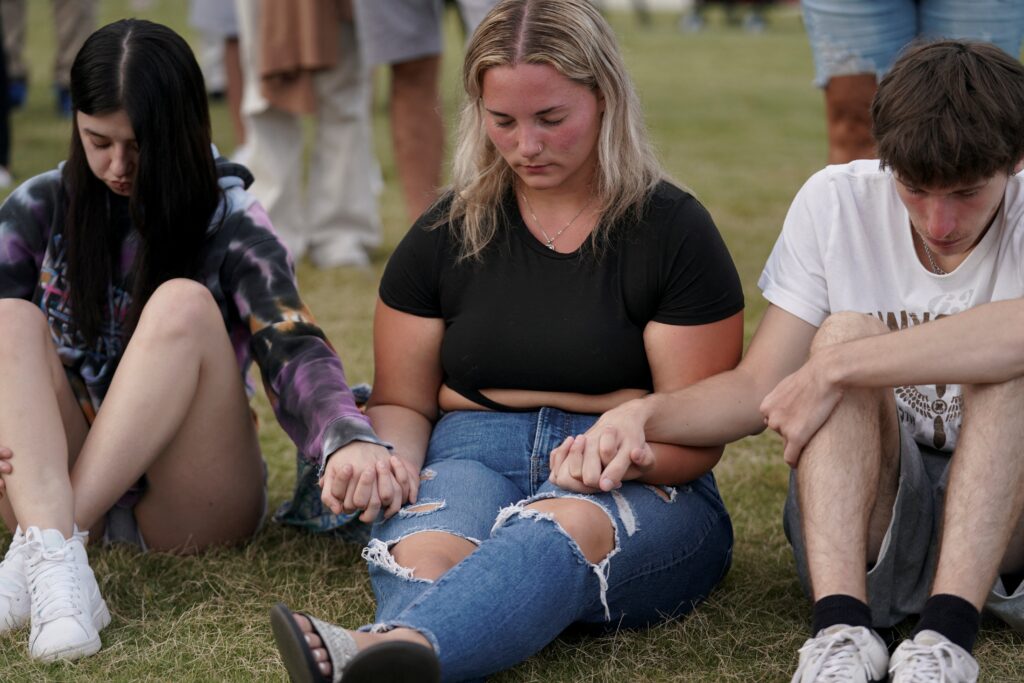 Holding back emotions, Catholic youth minister calls day of school 