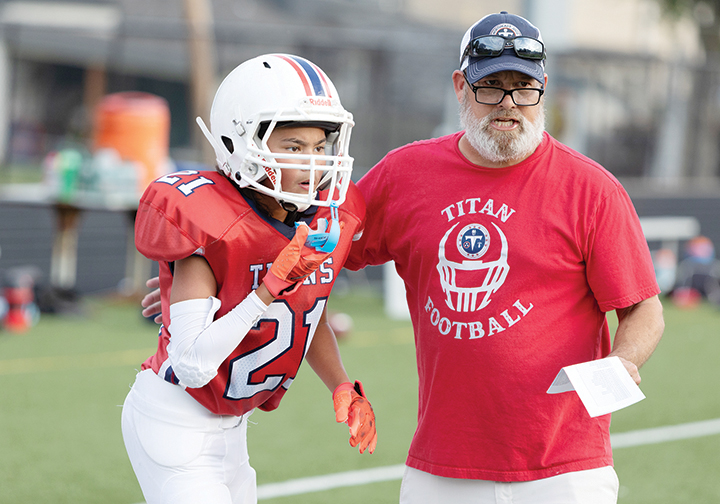 Gridiron Gospel: CYO coaches turn football into faith formation